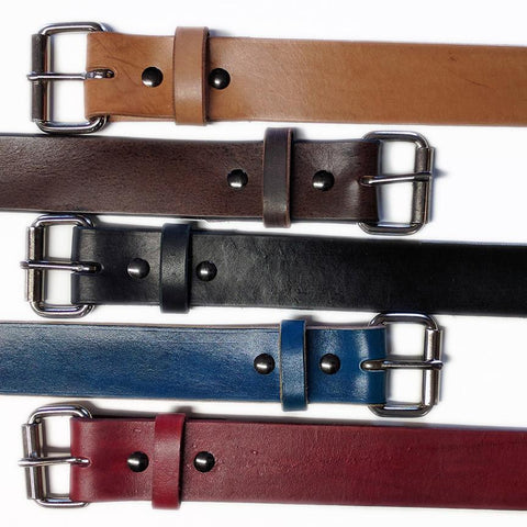 handmade leather belts available in red, blue, black or brown.
